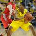 Michigan sophomore Trey Burke holds the ball around Ohio State junior Aaron Craft during the first half at Crisler Center on Tuesday, Feb. 5. Melanie Maxwell I AnnArbor.com